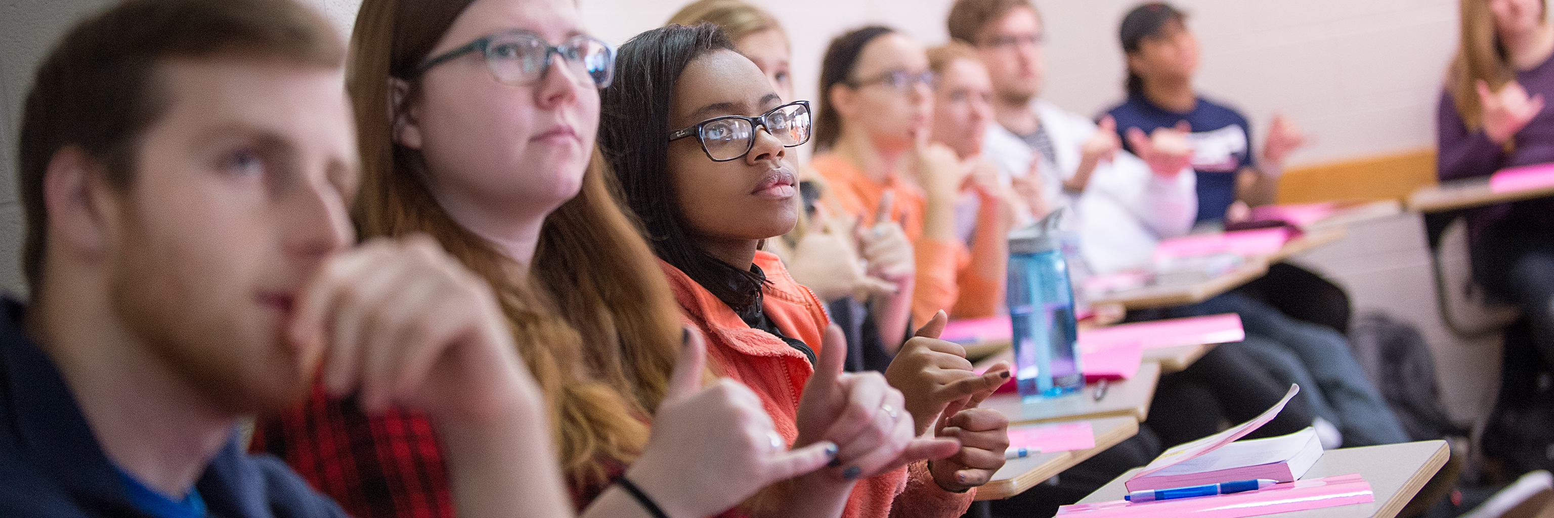 Students participate in signing during a Department of Speech and Hearing American Sign Language Sequence class on the Indiana University Bloomington campus.