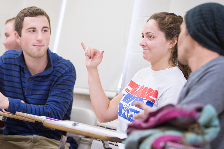 Students practice signing in class on the Indiana University Bloomington campus. 