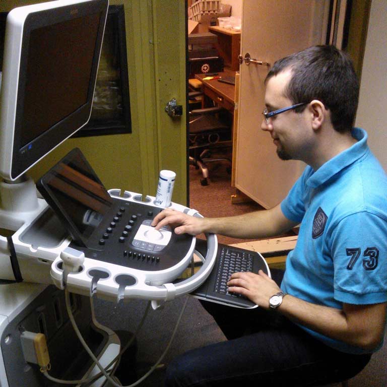 student looking at keyboard